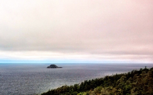 Iceberg (just a tiny spec to the left of the island.)